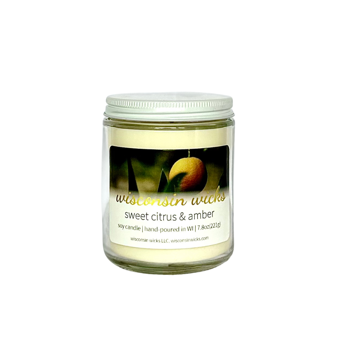 Sweet Citrus & Amber Classic scented jar candle with a transparent background